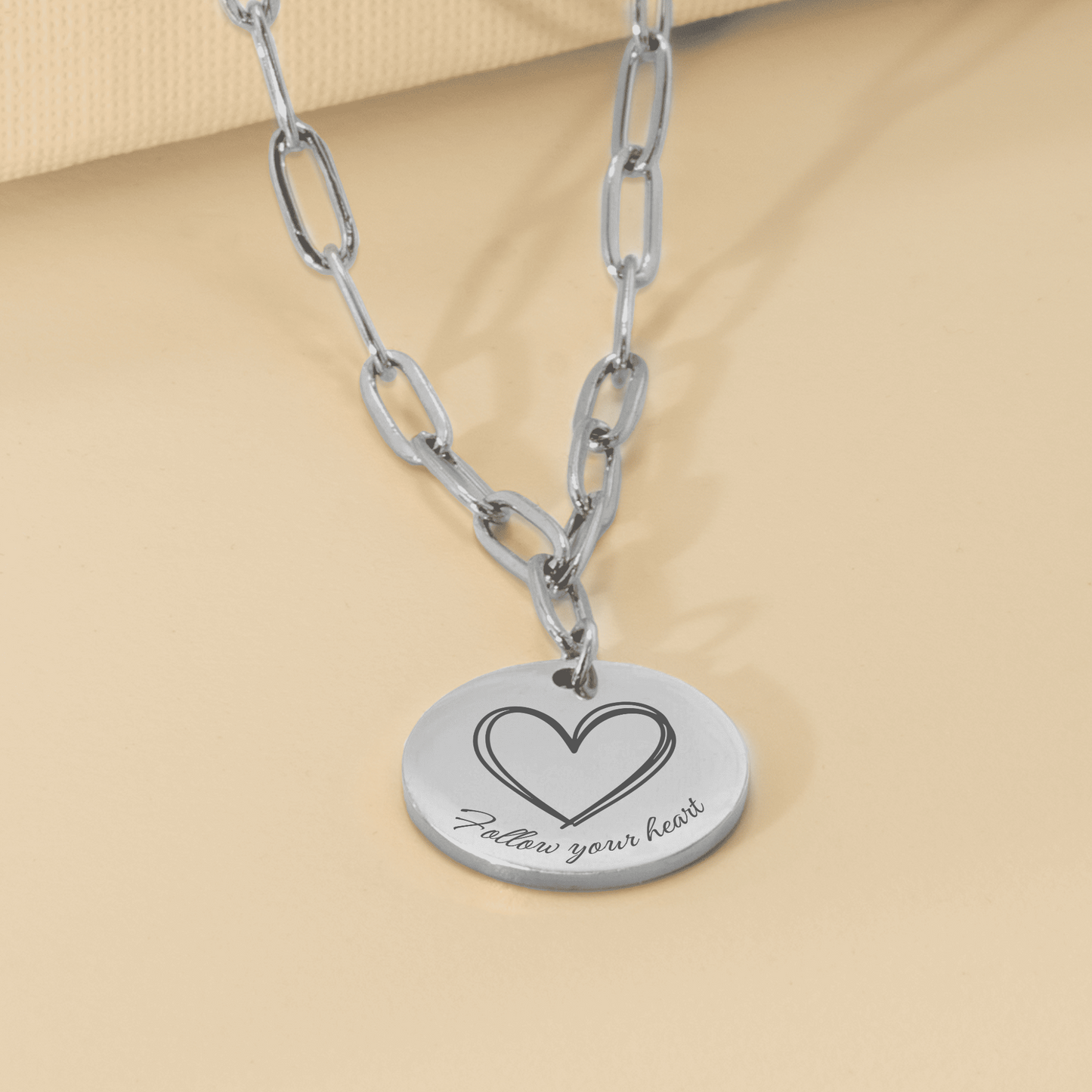 Zilveren paperclip ketting affirmatieketting Follow your heart en hartje – betekenisvol sieraad voor liefde en vertrouwen